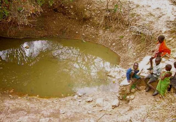 Children at a water dam