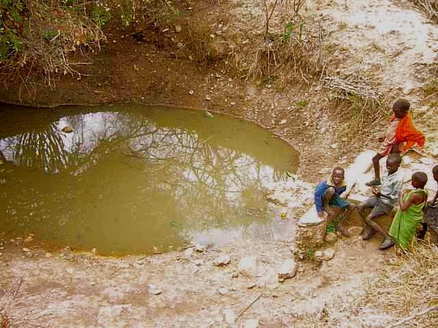 Children at a water dam